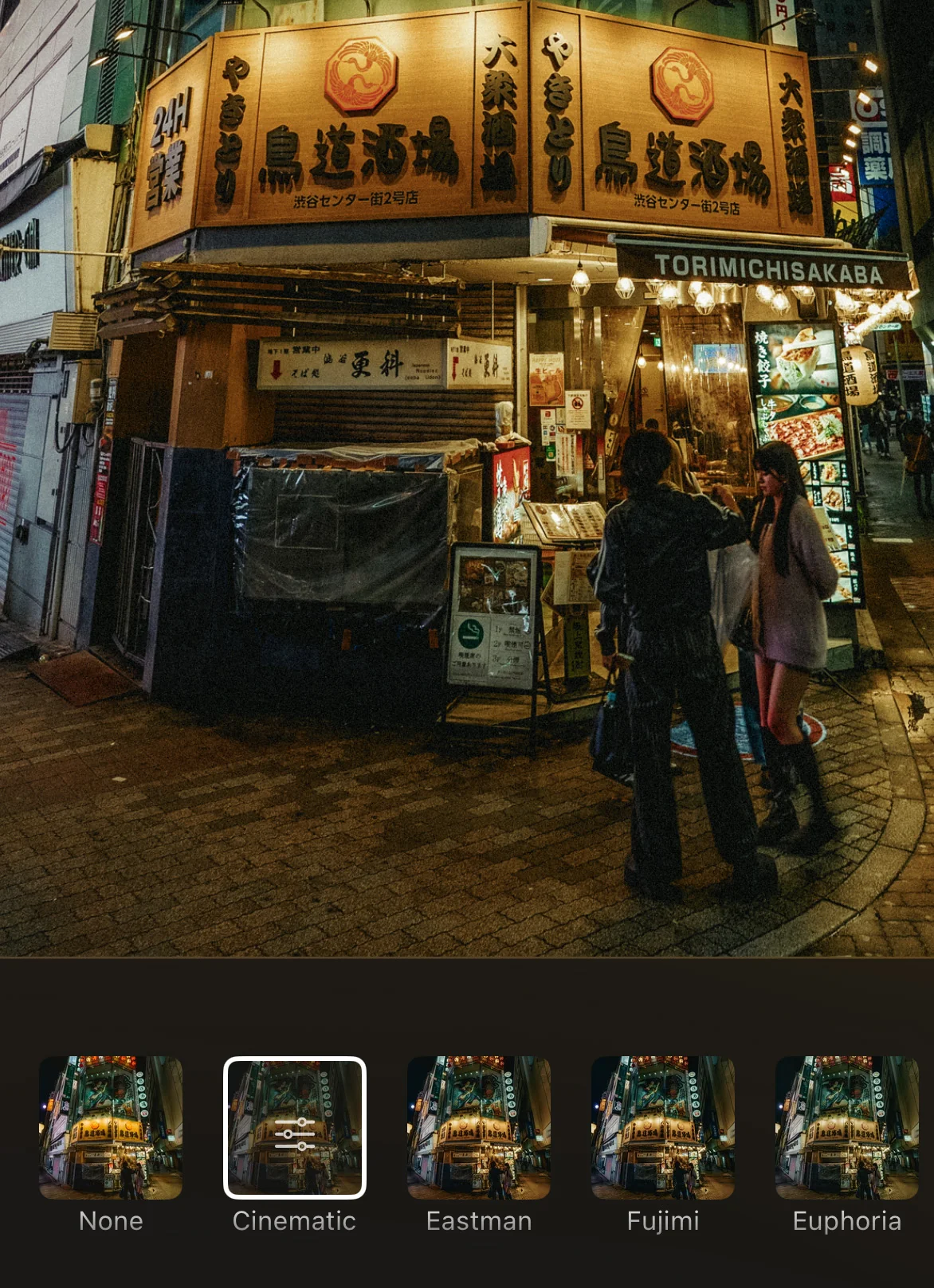 DeluxeFX cinematic LUT picker on a Tokyo street night scene